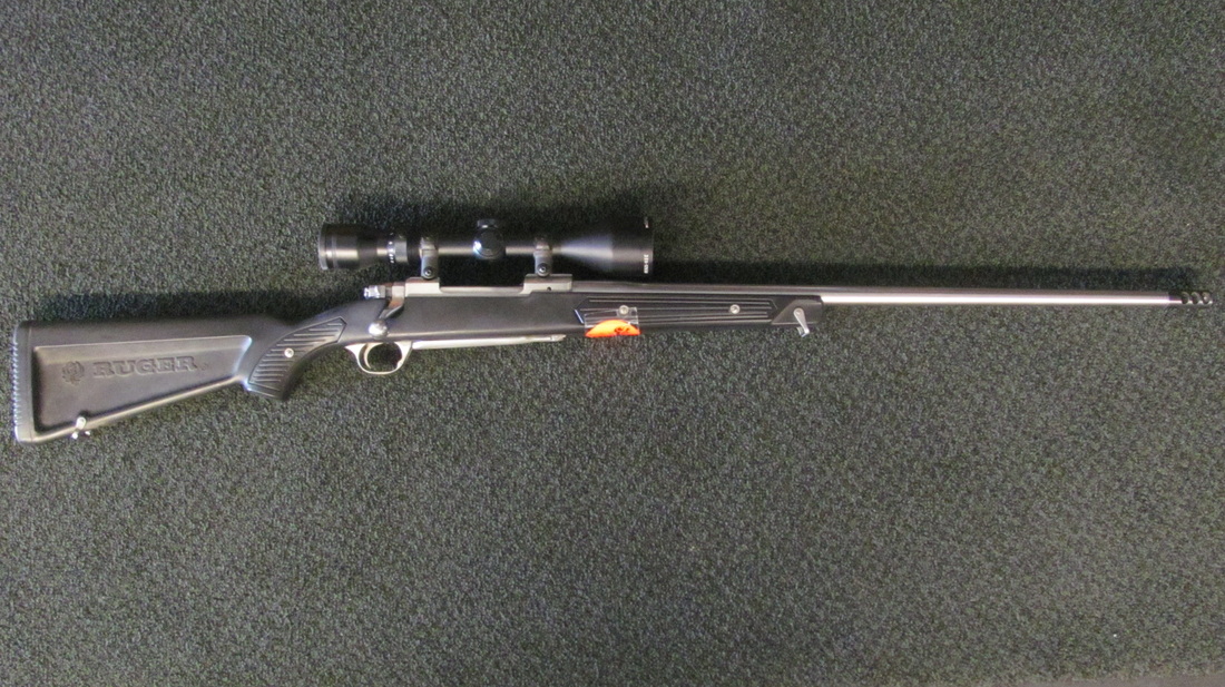 Ruger 338 Mag Model M77 Mark Ii Bolt Action Rifle With A Tasco 35x